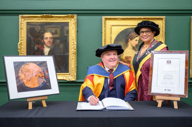 LOCAL BUSINESSMAN HONOURED BY THE UNIVERSITY SALFORD