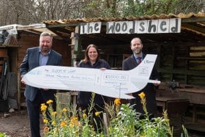 L R Cllr Bill Fairfoull Community Trust Fund trustee Joanne McColl Parry of BLOOM Allotments and Jonathan Reynolds MP