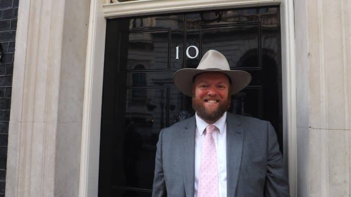 Richard Hillgrove in front of No. 10 Downing Street